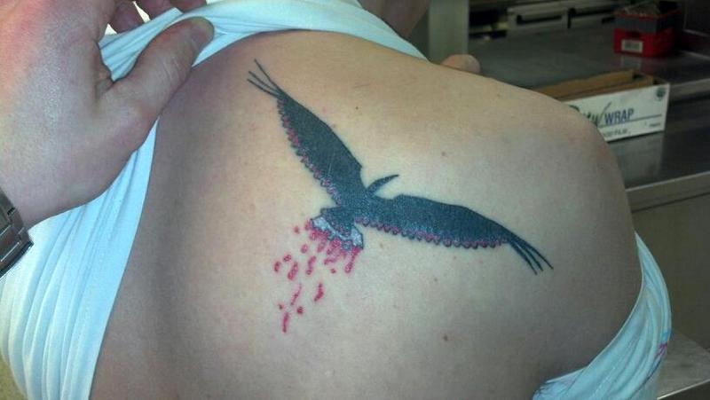 татуировка фламинго